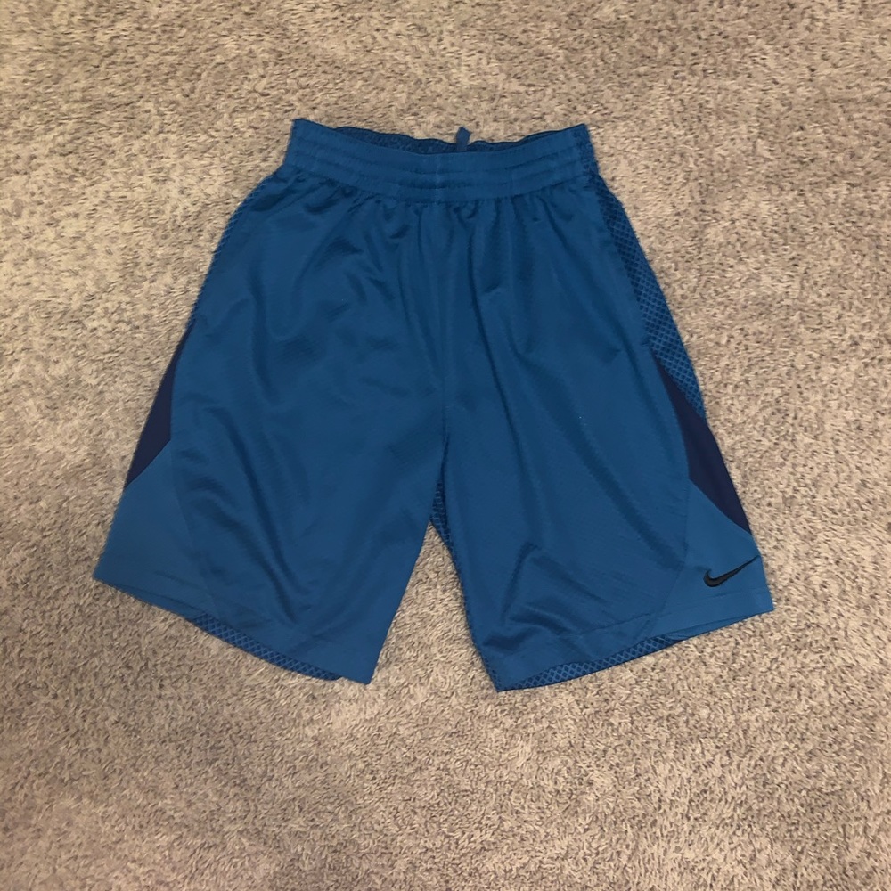 Blue Nike athletic shorts